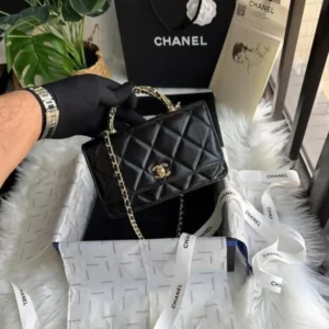 Chanel 24B WOC Top Handle in Black Shiny Lambskin GHW